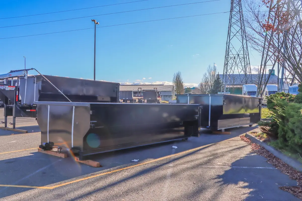 Roll-off dumpster ready for waste disposal at job site for 3 Yard Dumpster Rental in Goldsboro